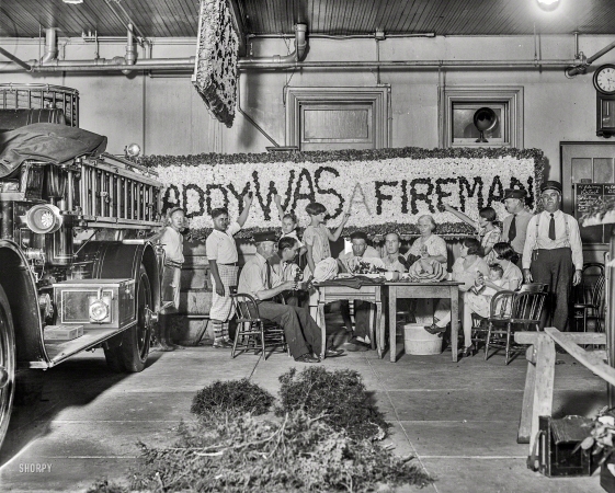 Photo showing: Daddy WAS a Fireman -- Washington, D.C., circa 1928. Fire Dept. truck decorating.