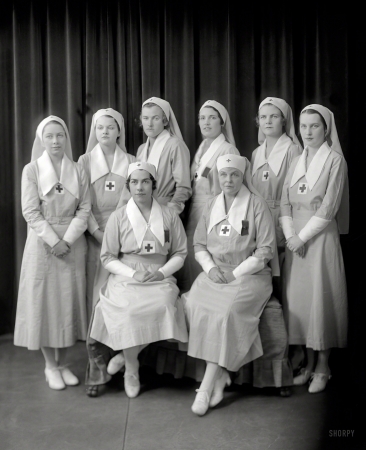 Photo showing: Eight Nurses -- Washington, D.C., circa 1920s. An octet of Red Cross nurses.