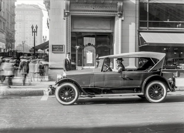 Photo showing: Que Sera, Sera -- San Francisco circa 1922. Dorris touring car at Shreve & Co.