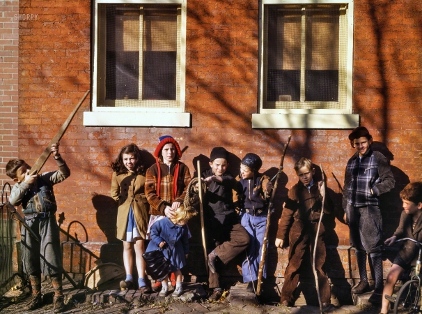 Photo showing: The Home Front -- Washington, D.C., 1942. Children playing, aiming sticks as guns.