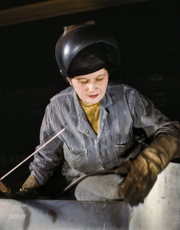 Photo showing: Doomsday Weld -- February 1943. Enola O'Connell, age 32, widow and mother of one child, ex-housewife, now the
only woman welder at Heil and Co., Milwaukee, maker of gasoline trailers for the Army Air Forces.