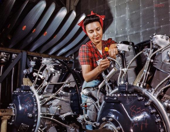 Photo showing: Wright Cyclone -- June 1942. Inspecting a Cyclone airplane motor at North American Aviation in Long Beach, California.