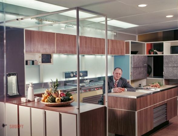 Photo showing: Kitchen of Tomorrow -- 1954. Harley Earl, General Motors Vice President of Design, in Frigidaire's 'Kitchen of Tomorrow' exhibit for the GM Motorama.