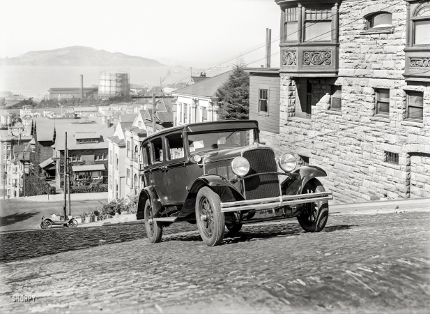 Photo showing: Onward and Upward -- San Francisco circa 1928. DeSoto sedan. On Webster Street at Vallejo.