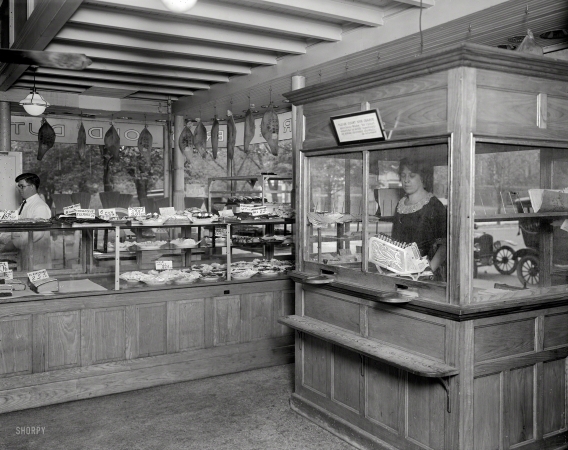 Photo showing: Count Your Change -- September 1921. Washington, D.C. Old Dutch Market Bakery.