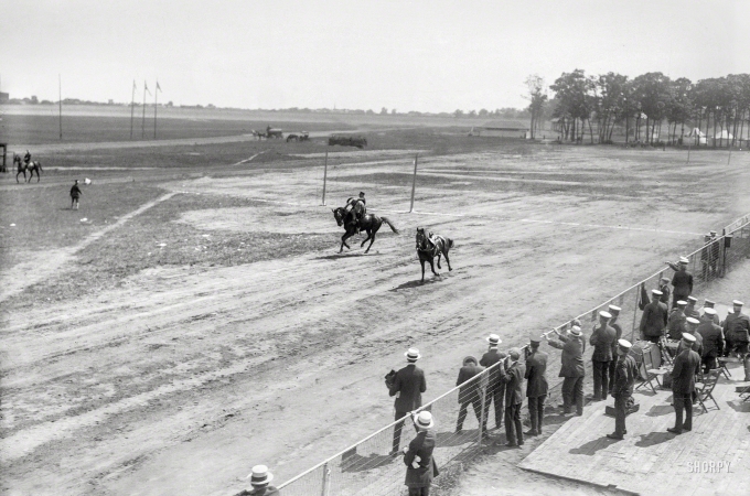 Photo showing: Runaway! -- June 24, 1916. Police show at Sheepshead Bay Speedway -- rescuing woman from runaway horse.