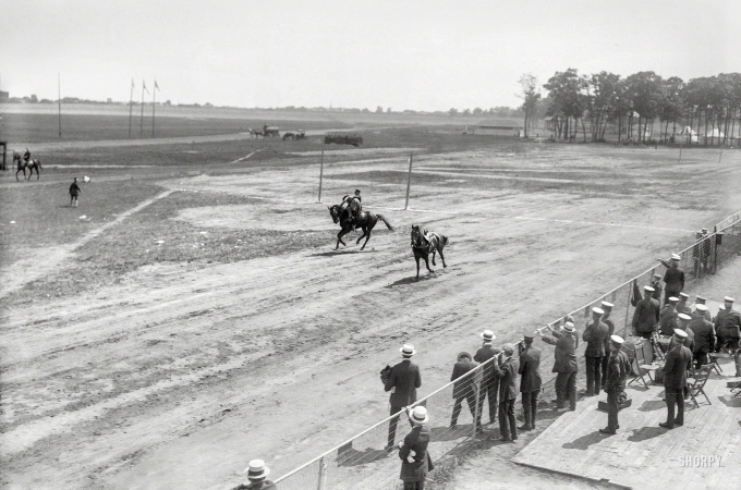 Photo showing: Runaway! -- June 24, 1916. Police show at Sheepshead Bay Speedway -- rescuing woman from runaway horse.