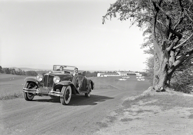 Photo showing: Playing Through -- San Francisco, 1931. Cord L-29 roadster at golf course.