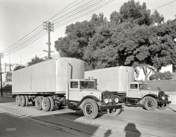 Photo showing: Big Rigs -- August 15, 1936. Sterling trucks in San Francisco. drive that looks like something off a giant bicycle. 