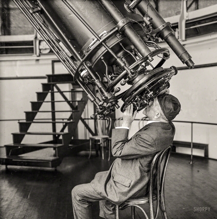 Photo showing: Naval Gazer -- August 18, 1924. Prof. Hall of Naval Observatory with 26-inch telescope.