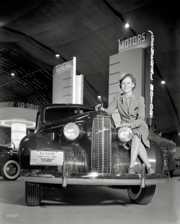 Photo showing: Those Were the Days -- San Francisco, 1939. General Motors exhibit, Golden Gate International Exposition. Girl sitting on LaSalle auto.