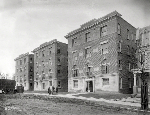 Photo showing: Moving In -- Washington, D.C., circa 1920. 28th Street apartments.