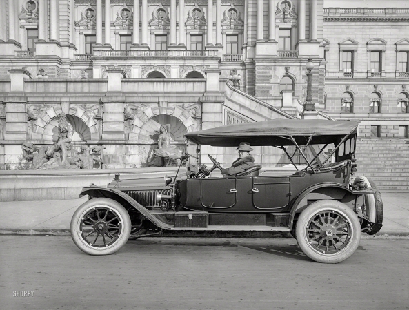 Photo showing: Going in Style -- Washington, D.C., circa 1920. National Photo Company proprietor
Herbert E. French in a Packard touring car at the Library of Congress.