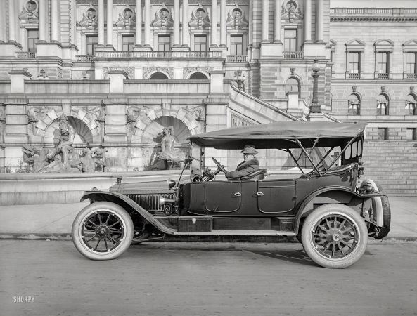 Photo showing: Going in Style -- Washington, D.C., circa 1920. National Photo Company proprietor
Herbert E. French in a Packard touring car at the Library of Congress.