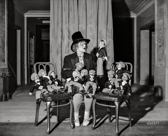 Photo showing: Small Businessmen -- Washington, D.C. March 1938. Dorothy Fletcher Howarth impersonating Secretary Roper and the Little Business Men.