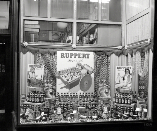Photo showing: Ninety-Nine Bottles -- New York circa 1948. Ruppert Beer display in grocery window.