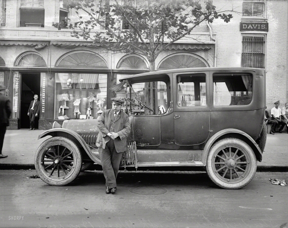 Photo showing: Battered Barouche -- Washington, D.C., 1921. Studebaker car.