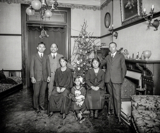 Photo showing: A Haraguchi Christmas -- Washington, D.C., circa 1922. Japanese legation -- military attache of the Japanese Embassy.
General Hatsutaro Haraguchi, second from left; the girl with the doll is his daughter Kukiko.