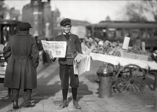 Photo showing: DYNAMITE KILLS TWO BABES -- Nov. 18, 1920. Newsboy holding the Washington Times. Details <a href=http://www.shorpy.com/node/19729><u>here</u></a>.