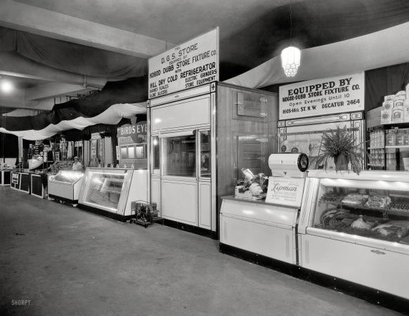 Photo showing: Dry Cold -- Washington, D.C., circa 1935. D.G.S. Store and other vendors at trade exhibition.