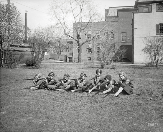 Photo showing: Aim Low -- Washington, D.C., circa 1925. Girls' rifle team, George Washington University.