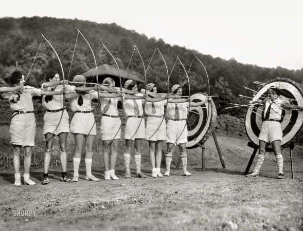 Photo showing: Bonus Points -- August 23, 1928. Demonstration of fancy shooting by girl archers from Camp Greystone.