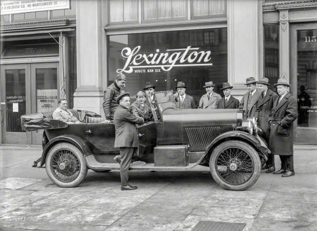 Photo showing: Minute Man Men -- San Francisco circa 1921. Lexington 'Minute Man Six' dealer window, Van Ness Avenue. 