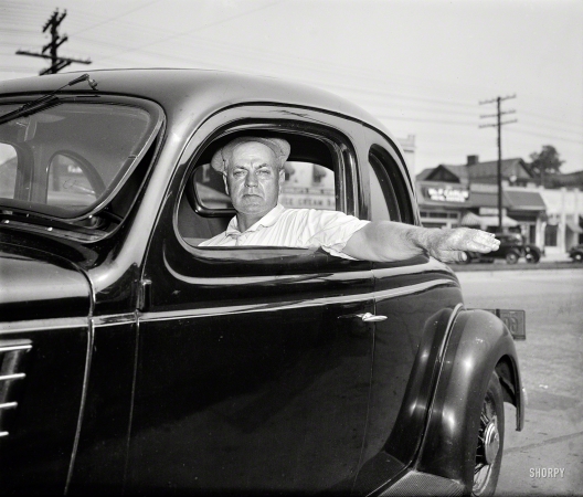 Photo showing: A Good Turn -- Washington, D.C. -- Safest driver of 1936, John W. Hunter.