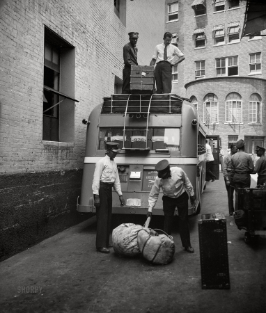 Photo showing: Luggage Lugged -- Washington, D.C., 1936. Bus transportation -- loading baggage on motor coach.