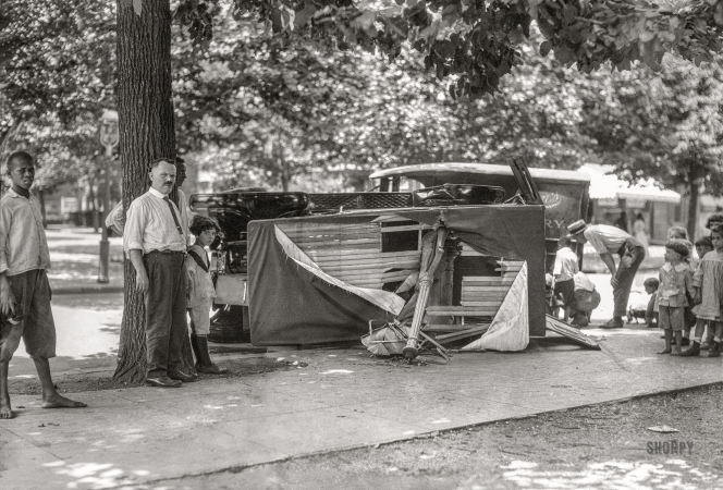 Photo showing: Truck Amok -  -- Washington, D.C., circa 1920. Truck accident and damaged streetlight.