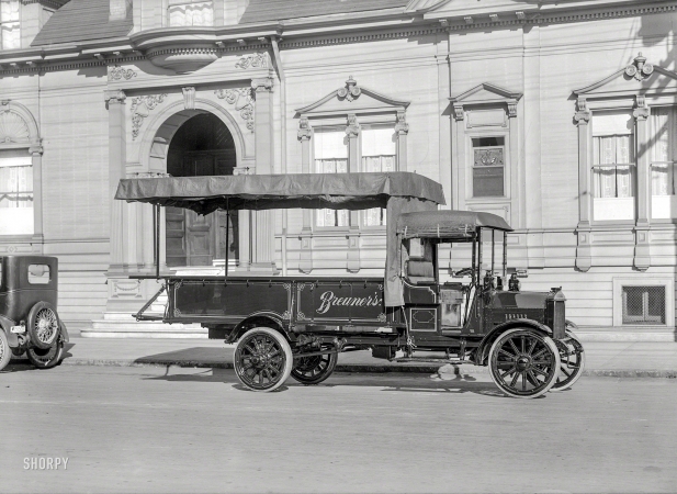 Photo showing: Delivering the Goods -- San Francisco, 1919. Federal truck -- Breuner's furniture van.