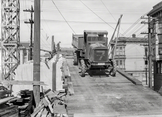 Photo showing: Jurassic Truck -- San Francisco, 1922. Fageol dump truck on construction ramp.