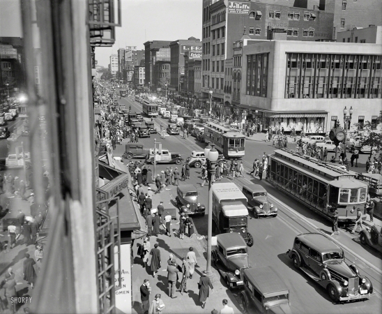 Photo showing: F Street View -- 1935. F Street, Washington, D.C. The view from the Harris & Ewing photographic studio.