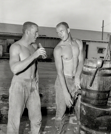 Photo showing: Drinking Buddies -- From the mid-1950s, somewhere in the U.S. of A.: Two Men and a Barrel.