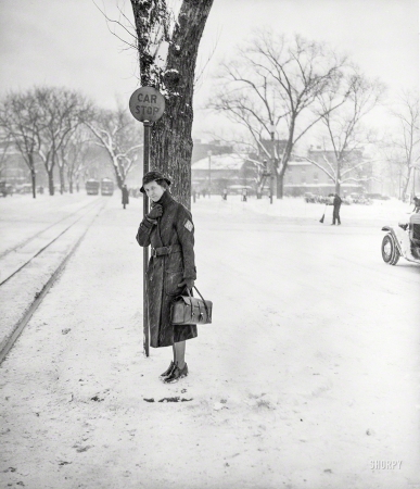 Photo showing: Bring It -- February 1936. Washington, D.C. Woman in snow.