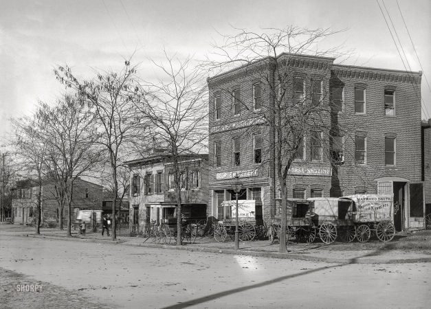 Photo showing: Park Your Wagon -- Washington, D.C., circa 1901. View of E Street S.W. between Delaware Avenue & First Street, looking northwest.
