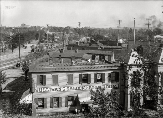 Photo showing: Sullivans Saloon -- Washington, D.C., circa 1901. Elevated view of Virginia Avenue S.W. at E Street, showing Sullivan's Saloon & Pool Room.