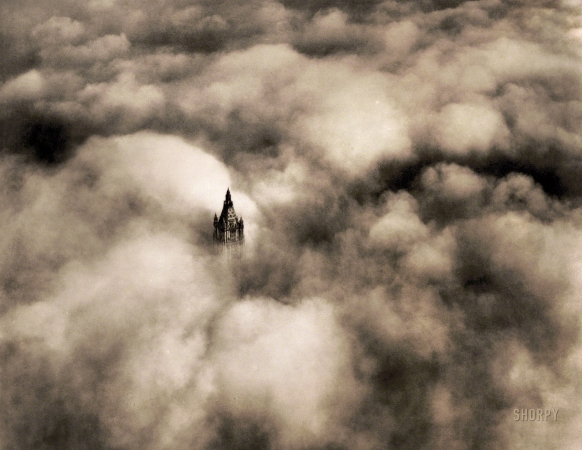 Photo showing: Storm King -- May 22, 1928. Woolworth tower in clouds, New York City.