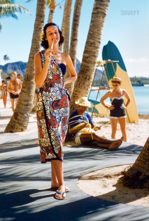 Photo showing: Beach Chic -- Honolulu, 1957. On the beach at Waikiki.