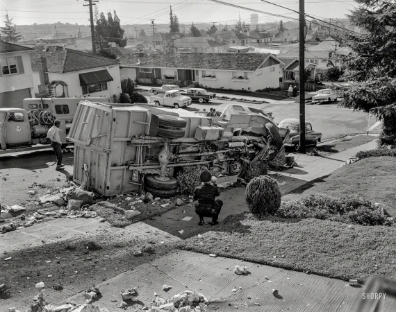 Photo showing: Trash Crash -- Oakland, California, circa 1959. Garbage truck accident.