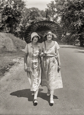 Photo showing: Taking the Air. -- 1924. Washington, D.C. Rock Creek Park. Miss Katherine Wren and Norvelle Munford.