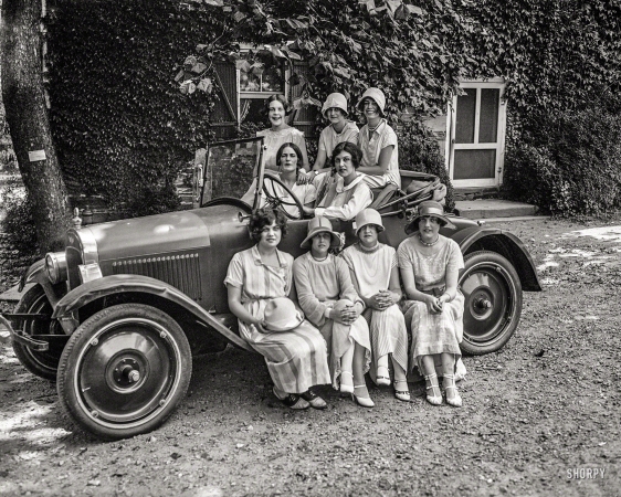 Photo showing: Smart Car -- Washington, D.C. Rock Creek Park scenes -- young women in automobile.
