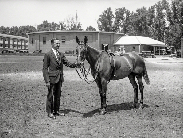 Photo showing: Gift Horse -- May 1925. Major John G. Quekemeyer, formerly aide-de-camp to General Pershing, with 'Argentina,'
a six-year-old Polo pony given to him by the Minister of War of the Argentine Republic, General Justo.