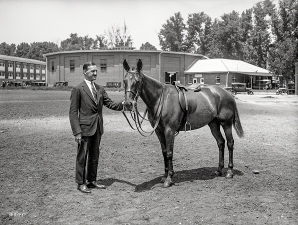 Photo showing: Gift Horse -- May 1925. Major John G. Quekemeyer, formerly aide-de-camp to General Pershing, with 'Argentina,'
a six-year-old Polo pony given to him by the Minister of War of the Argentine Republic, General Justo.