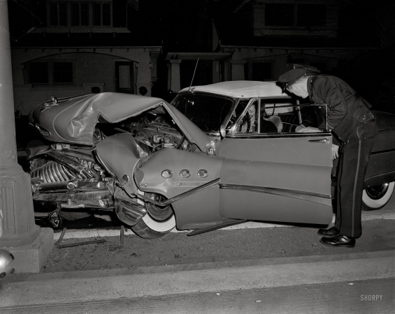 Photo showing: Crumple Zone. -- Oakland, California, circa 1955. Wrecked Buick.