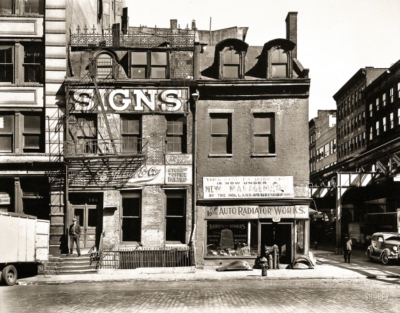 Photo showing: Signs -- Oct. 9, 1935. Broome Street, Nos. 504-506, Manhattan.