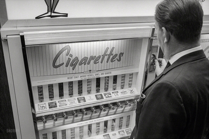 Photo showing: Cigarettes -- April 20, 1965. Vending Machines, Cigarettes.