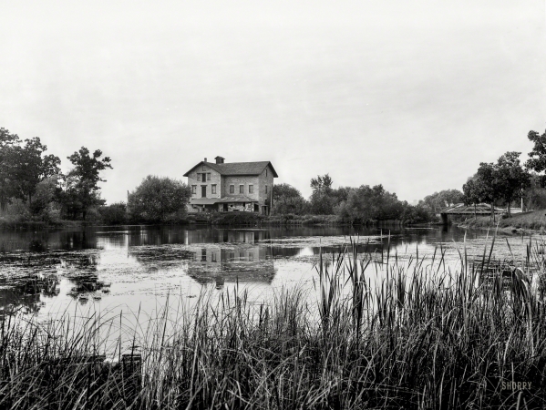 Photo showing: The Old Mill -- Green Lake, Wisconsin, circa 1899. Old mill at railway station.