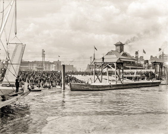 Photo showing: Waiting for Rex -- The Mississippi River circa 1900. Mardi Gras, New Orleans. Awaiting Rex on the levee.