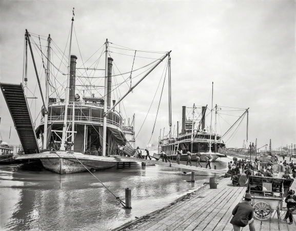Photo showing: High Water -- Loading steamer during high water, March 23, 1903, New Orleans.